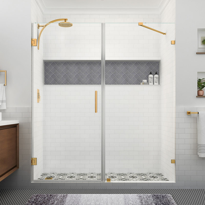 Nautis XL 73.25 to 74.25 in. W x 80 in. H Hinged Frameless Shower Door with Clear StarCast Glass, Brushed Gold