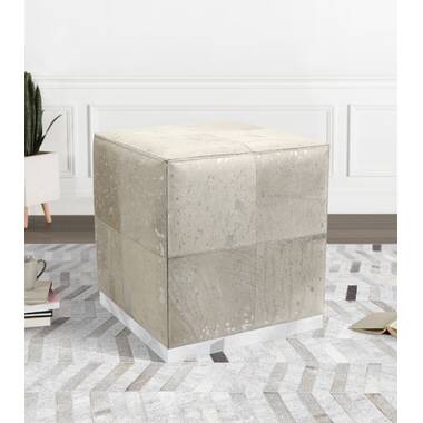 Safari Cowhide Upholstered with Stainless Steel Base Ottoman