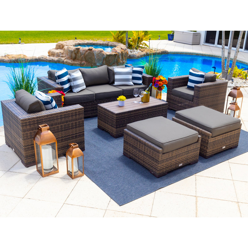 Sorrento Collection In Brown 7 - Person Patio Conversation Set with Cushions, Canvas Charcoal Sunbrella® Canvas