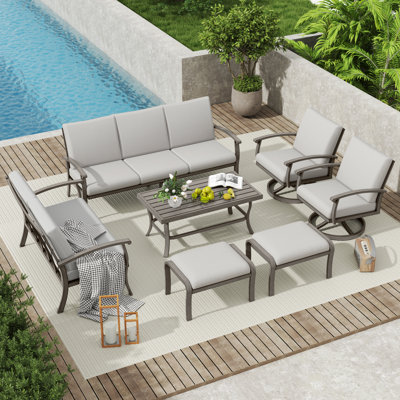 Ensemble de conversation de patio 7 pièces en aluminium avec table basse, table de bout, repose-pieds et coussins gris clair