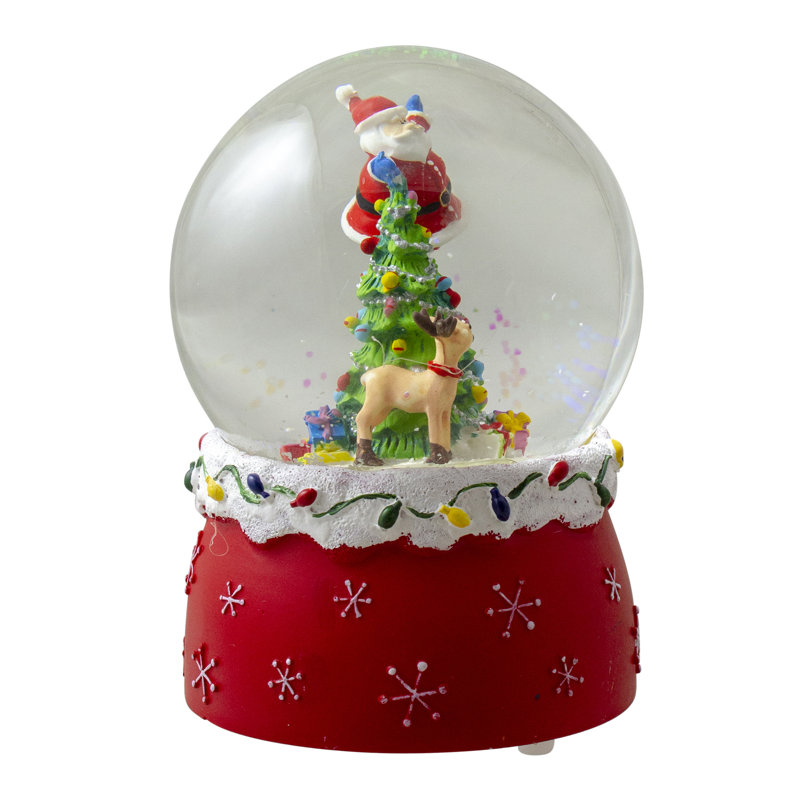 Boule à neige musicale 5,75 "Père Noël décorant un arbre de Noël