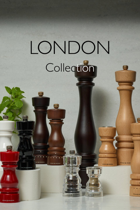 London Collection featuring an assortment of Cole & Mason pepper and salt mills in various wood finishes, colors, and sizes.