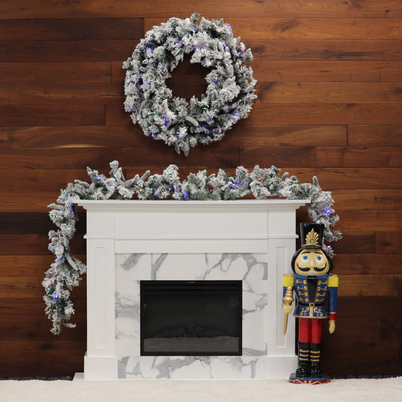 9-Ft Snow Flocked Pine Garland with LED Lights