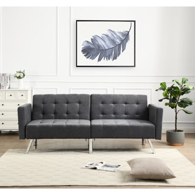 Canapé-lit gris foncé avec couchage réglable et confortable, facile à monter.
