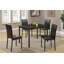 Table de salle à manger 5 pièces et 4 chaises avec plateau en faux marbre et chaises en similicuir noir