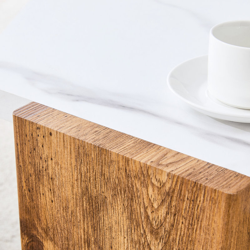 Table basse blanche pentagonale artistique de 31 pouces avec surface d'aspect marbre, structure de support triangulaire, capacité de 250 lb pour une utilisation quotidienne