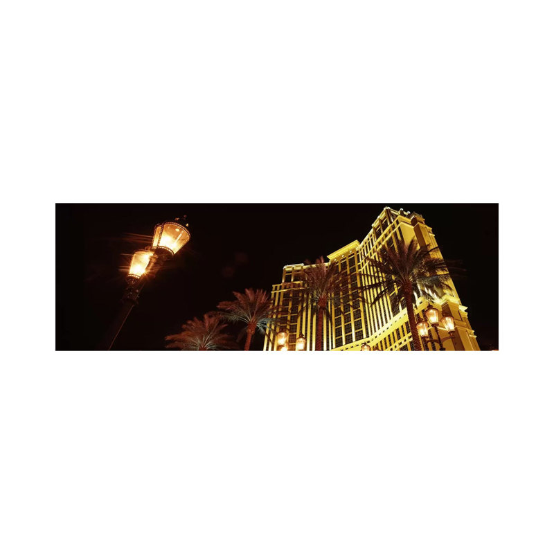 Low Angle View Of A Hotel Lit Up At Night, The Strip, Las Vegas, Nevada, USA - Wrapped Canvas Panoramic Print
