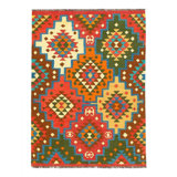 Felizarda Geometric Area Rug in Green