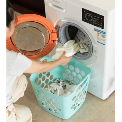 Panier à linge flexible en plastique avec poignées latérales