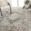 Pavel Distressed Medallion Low-Pile Machine-Washable Blue/Cream Rug-167430536