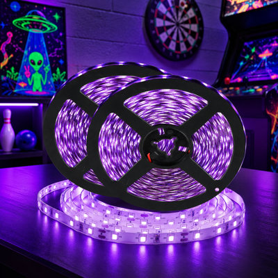A 50 Foot flexible blacklight strip with 900 LEDs, 12V operation, remote control, and dimming for indoor Halloween glow parties, body paint, birthdays, bedrooms, fluorescent tapestries, and posters.