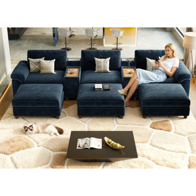 Canapé-lit modulaire 6 places avec méridienne, deux consoles polyvalentes, ports de recharge et housses lavables, chenille bleu marine
