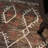 Suleman Hand Knotted Jute/Cotton Southwestern Rug in Dark Brown-21815092