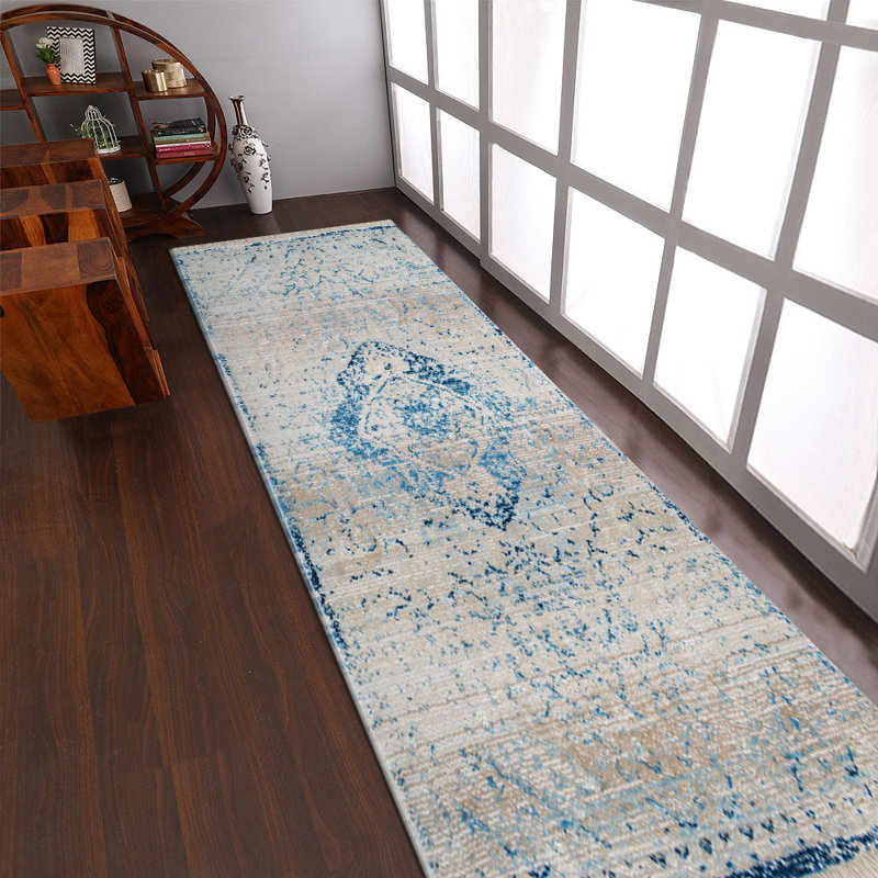 Tapis en polyester fabriqués à la machine Crayton - couleur bleue, conception orientale, tapis à poils courts pour le salon, la chambre à coucher