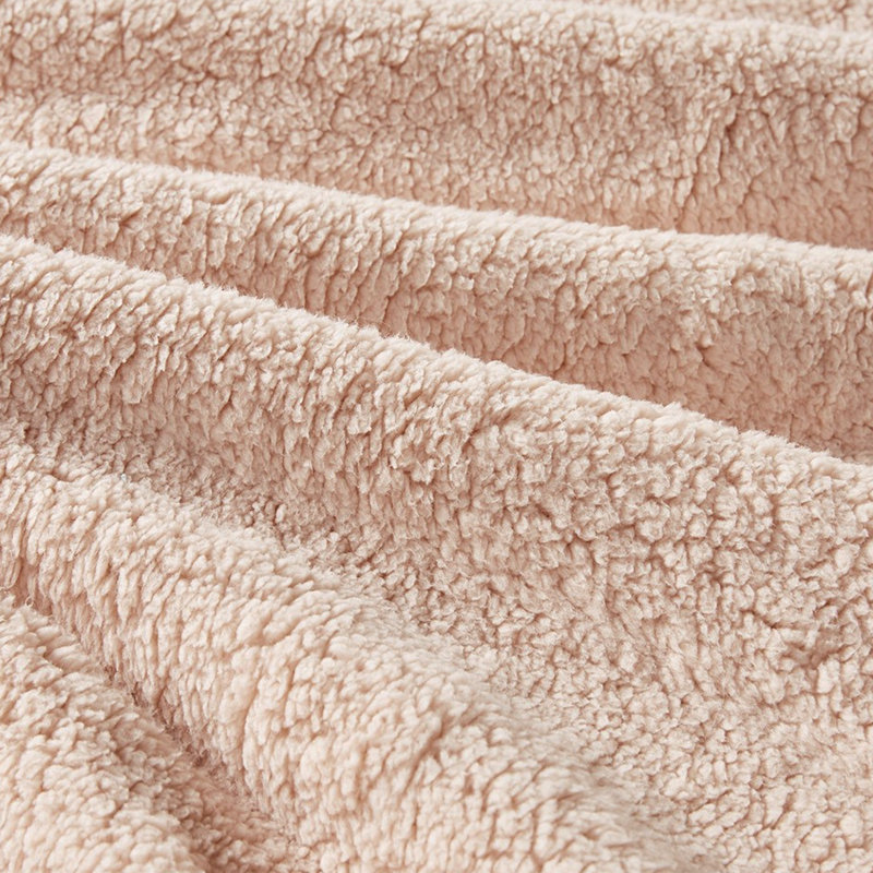 Édredon rose avec revers confortable et texture de velours écrasée réversible de luxe