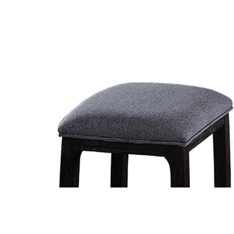 Tabouret de bar élégant en tissu gris vieilli, au charme authentique.
