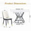 Ensemble de table et de chaises. Une table de salle à manger circulaire en panneau de fibres à densité moyenne de 47,3 po de diamètre, avec des supports en forme de sablier. Elle est assortie de 4 chaises en polyuréthane.