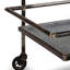 Chariot-bar en métal de style industriel avec deux niveaux et quatre roues pour une mobilité facile et une utilisation polyvalente dans n'importe quel environnement