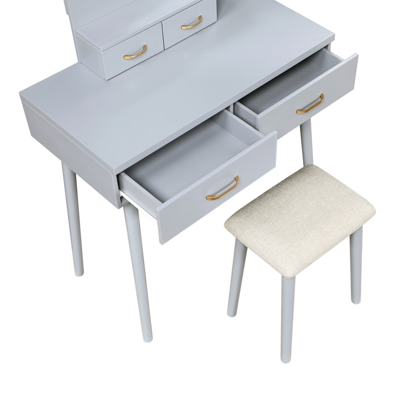 Coiffeuse de luxe pour chambre à coucher avec finition grise, miroir DEL, 4 tiroirs et tabouret rembourré pour présenter les cosmétiques. Tabouret assorti, en bois.