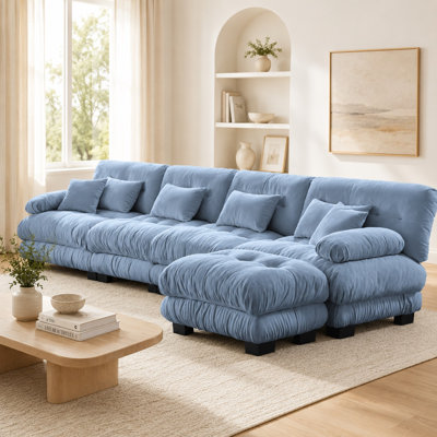 Canapé nuage 4 places en chenille bleue douce avec pouf et coussins moelleux pour se détendre