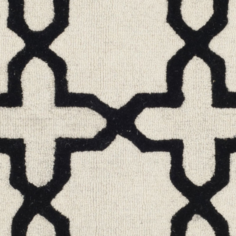 Hand-Tufted Black and Ivory Wool Area Rug, 2'6" x 4'