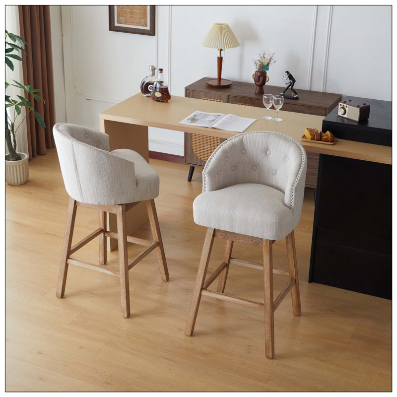 Ensemble de 2 tabourets de comptoir pivotants avec design rembourré, structure en bois d'hévéa massif, dossier et repose-pieds, idéal pour les comptoirs de bar et de cuisine