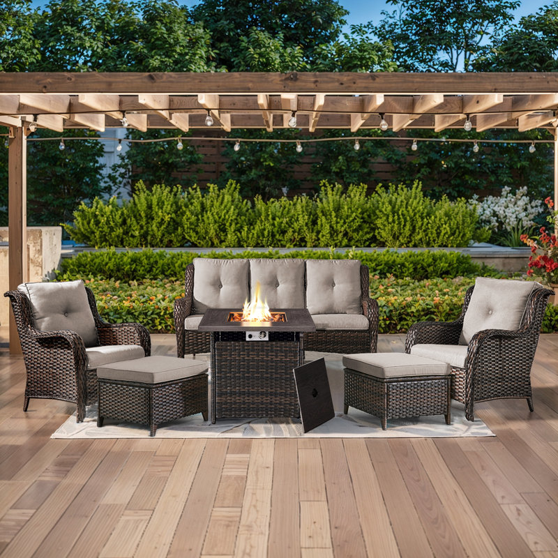 Schutt 5 - Person Wicker Outdoor Seating Group with Fire pit, Sofa, Chairs, Ottomans and Cushions, Brown, Beige
