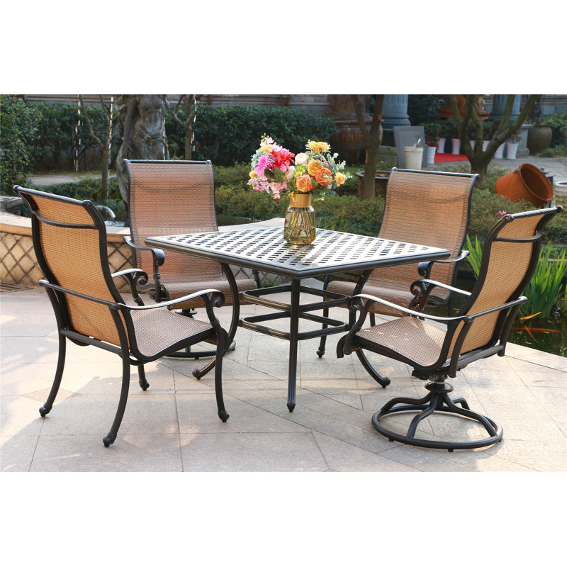 Annecorinne 4 - Person Patio Dining Set with Round Table