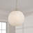 13.75" W x 15.25" H 1-Light Globe Pendant in Matte Brass with Faux Alabaster Glass and Alternating Loop Designer Chain