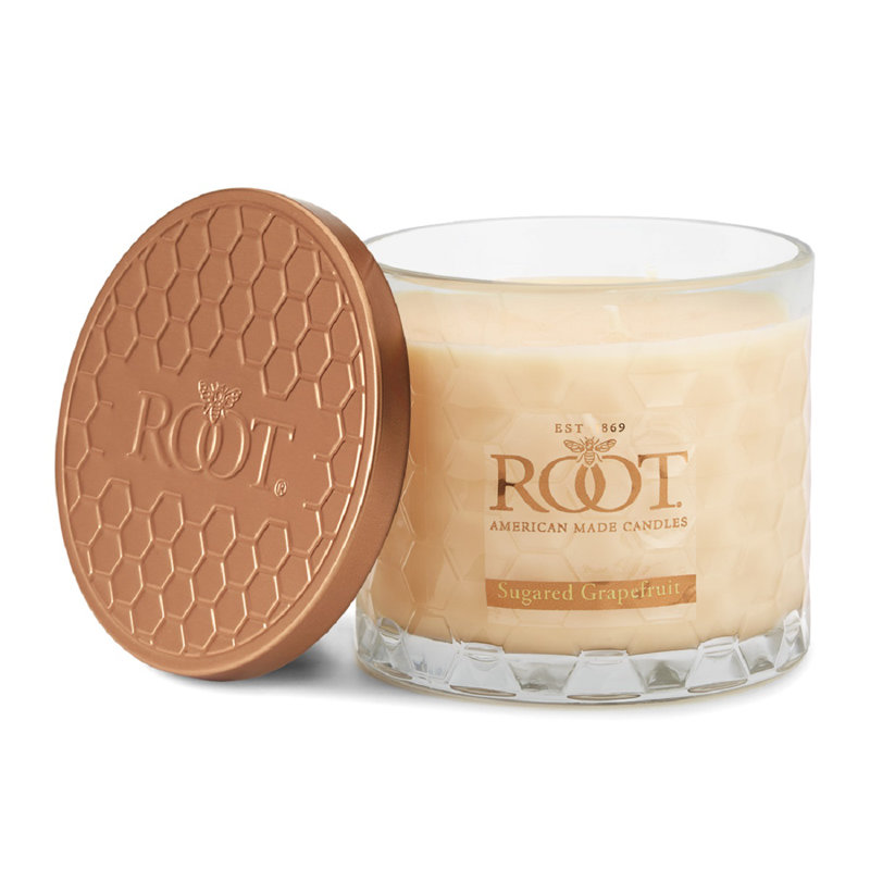 Bougie en pot parfumée au pamplemousse sucré