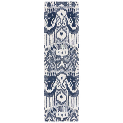 Tapis ivoire / bleu en laine / coton touffeté à la main Ikat