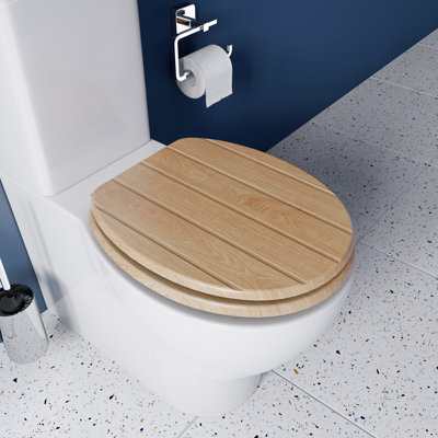 Flexi-Fix Geneva Toilet Seat - Adjustable Hinges with Top & Bottom Fixings Included and Rust & Stain Free Chrome Hinge Covers, Antibacterial Treated Surface (Light Oak)