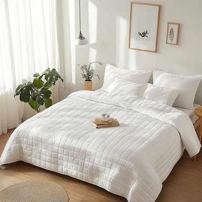 Plain white quilted duvet