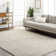Quach Machine Woven Polyester Area Rug in Cream