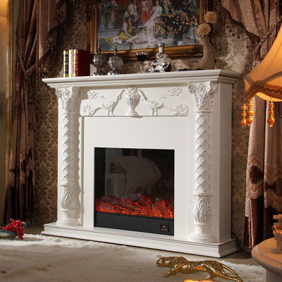 European-style neoclassical white decorative fireplace with silver tracing and electric simulated fire for the living room