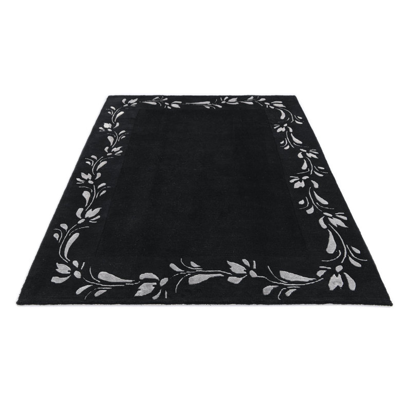 Tapis noir Iniguez