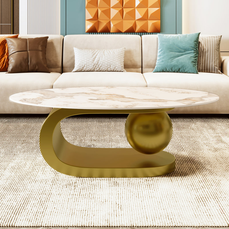 Table basse ovale moderne de 47,2 po avec plateau en pierre frittée à motif marbré et base en acier inoxydable doré