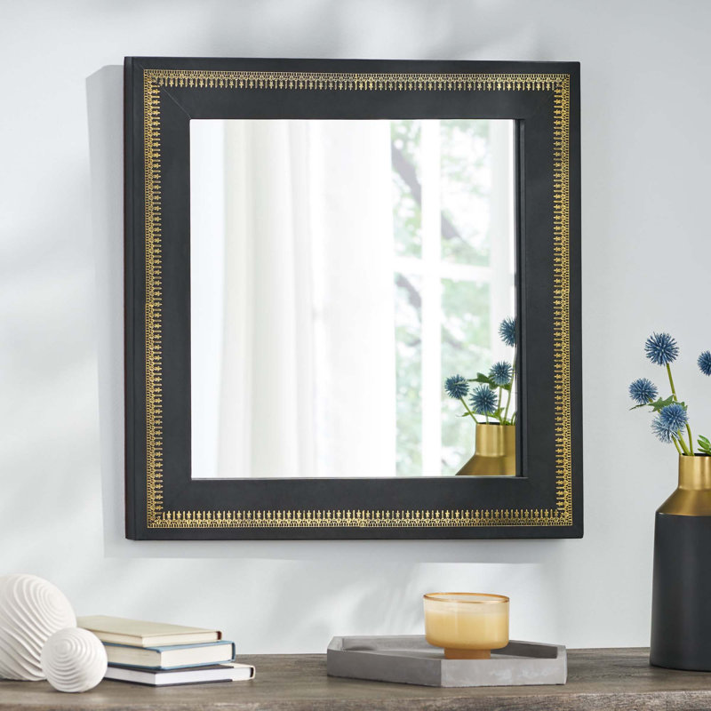 Miroir mural noir avec gaufrage doré