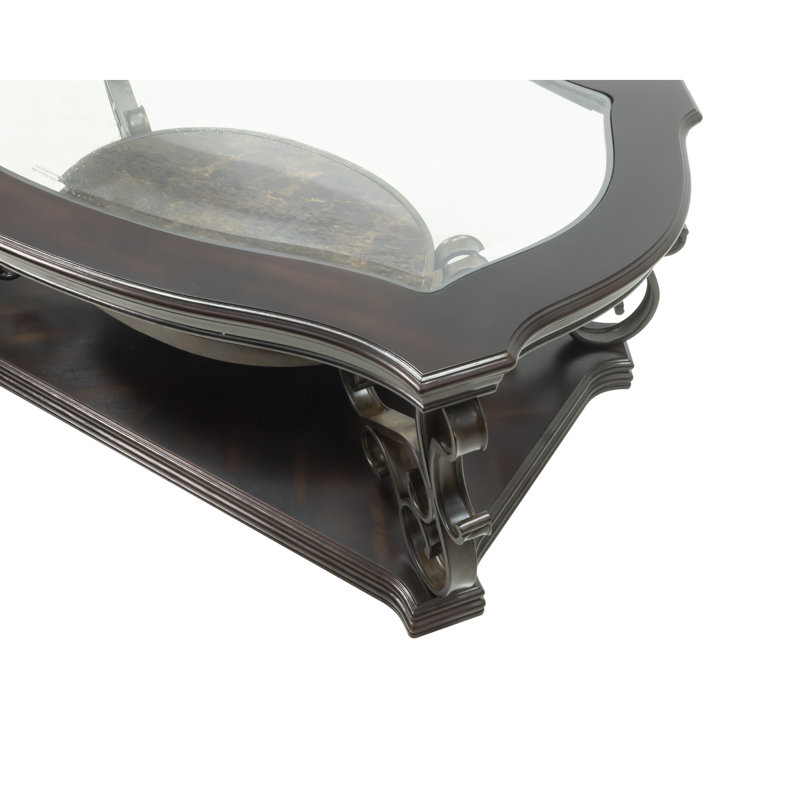 Table de cocktail en brun foncé, avec surface en verre et rangement, pieds en métal