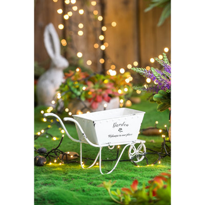 Jardinière brouette en métal blanc mesurant 11,5 x 4 x 7 pouces, idéale pour exposer sur la table de petits articles de fleurs vivantes