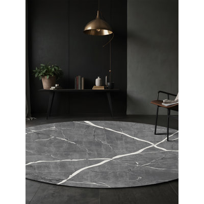 Tapis gris soyeux et moelleux