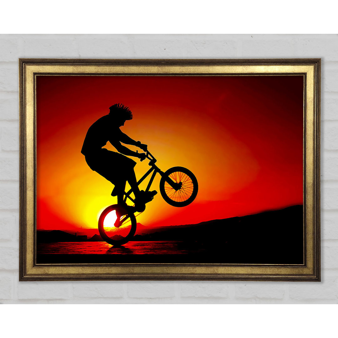 Gerahmtes Poster BMX Back Wheelie In Red Sunlight