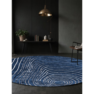 Tapis gris soyeux et moelleux
