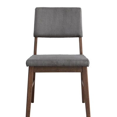Ensemble de deux chaises d'appoint en velours côtelé Seda, offrant des sièges confortables avec des coussins rembourrés et un design scandinave pour votre maison.