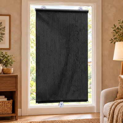 Store enrouleur temporaire occultant avec ventouses et système de fixation sans perçage pour une installation facile sur les portes, offrant une occultation totale, une protection contre la lumière du soleil et une intimité optimale au besoin.
