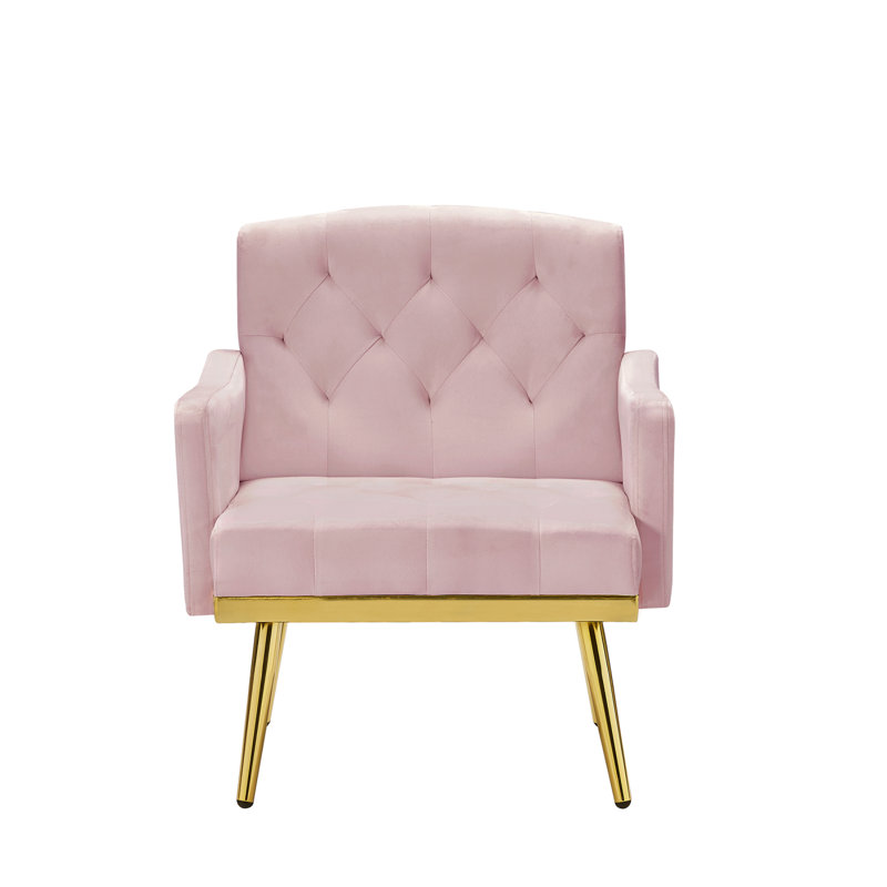 Fauteuil en velours rose avec pieds en métal