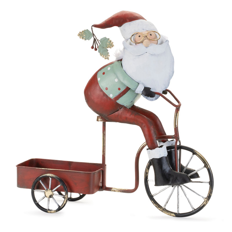 Père Noël fantaisiste faisant du vélo