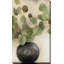 "Feuilles d'eucalyptus dans un vase noir (vertical)" par Lanie Loreth, reproduction sur toile