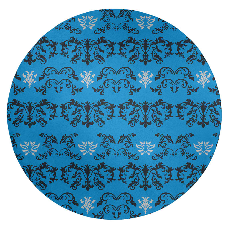 Tapis rond bleu damassé à motif baroque