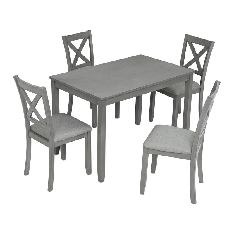 4 chaises et une table de salle à manger rectangulaire en bois, parfaites pour la cuisine et le salon